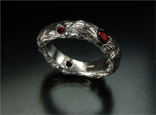 Natural twist sterling silver & almandine ring